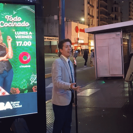 Street musicians and acrobat entertain crowds in Buenos Aires