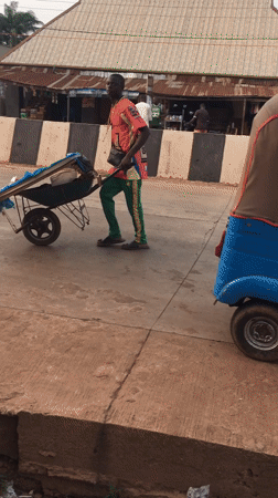 Wheelbarrow traffic documented on Isieke streets during afternoon hours