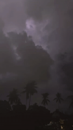 Lightning storm over Baan Hua Thanon at night