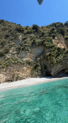 Boat tour captures scenic Budva coastline on sunny morning