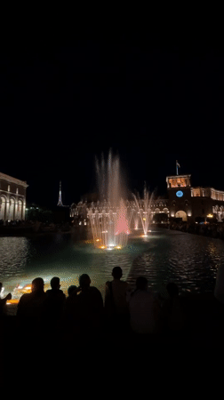 Evening crowds enjoy fountain light show at Yerevan's Republic Square