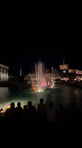 Evening crowds enjoy fountain light show at Yerevan's Republic Square