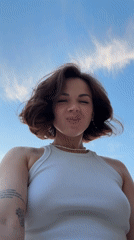 Woman records sunset selfies in Sarapul amid dramatic skies