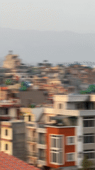 Witness documents Kathmandu cityscape during hazy morning conditions