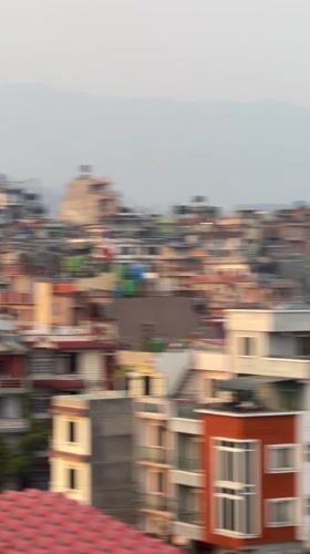 Witness documents Kathmandu cityscape during hazy morning conditions