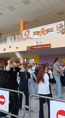 School gathering and artwork documented in Krasnoyarsk