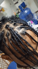 Hair braiding and makeup palette documented in Porlamar