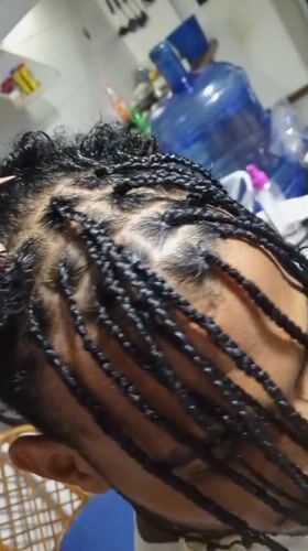 Hair braiding and makeup palette documented in Porlamar