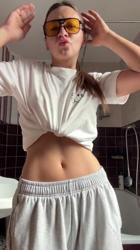 Woman documents morning bathroom routine in Fredenbeck, Germany