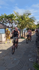 Morning activity captured on beachside walkway in Denpasar