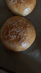 Home baker prepares sesame hamburger buns in Hrodna