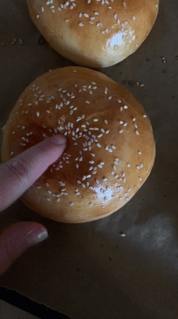 Home baker prepares sesame hamburger buns in Hrodna
