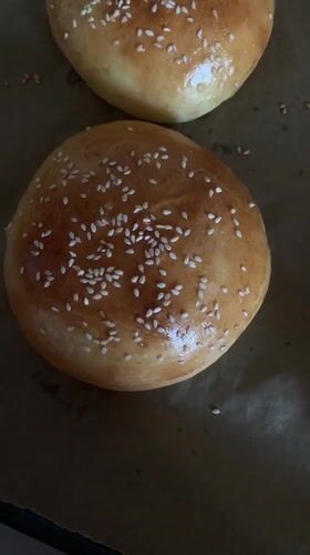 Home baker prepares sesame hamburger buns in Hrodna
