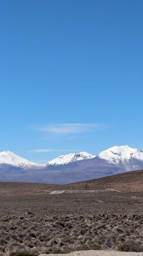 Construction crew operates concrete mixing site in Chilean desert