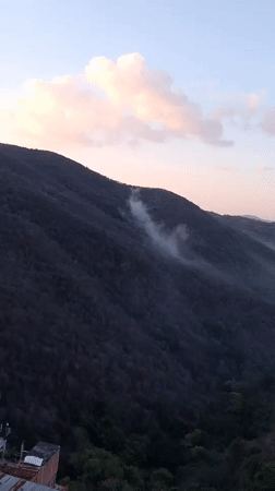 Foggy mountain vista captured in evening Caracas