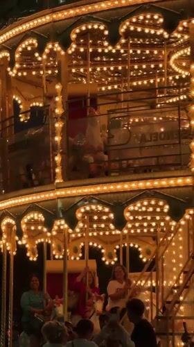 Late-night carousel draws families in Puebla, Mexico