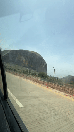 Zuma Rock documented from roadside perspectives in Nigeria