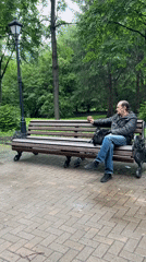 Man feeds squirrel in Yekaterinburg park while being filmed