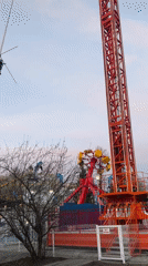 Evening crowds enjoy amusement park activities in Tyumen, Russia