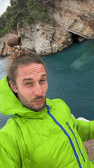 Man records selfie video near water in Petrovac, Montenegro