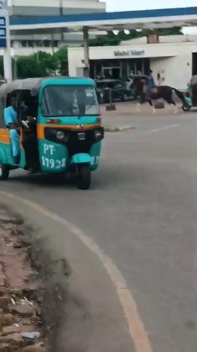 Afternoon street life around Jos's Revenue House district