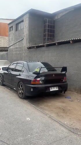 Purple Mitsubishi Lancer Evolution spotted parked in Arica, Chile