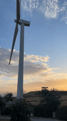 Wind turbines filmed during sunset in northern Israel