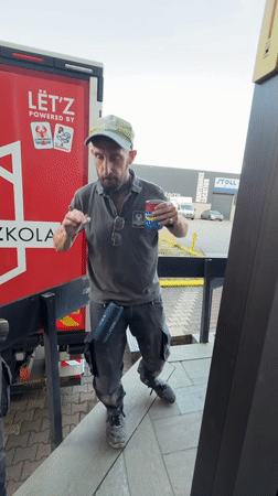 Coffee break beside a branded red truck in Leudelange