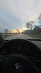 Dashboard cam captures sunset drive on rural Bulgarian road