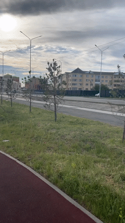 Woman exercises with jump rope at Kazakhstan park