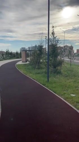 Woman exercises with jump rope at Kazakhstan park