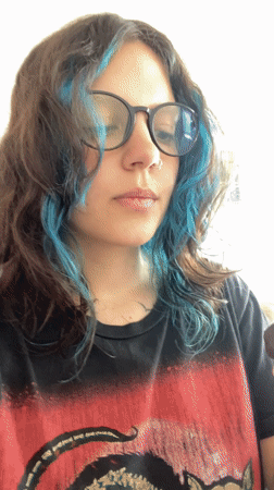 Person enjoys stuffed date treat in Gijón workspace