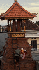 Sunset selfies and temple maintenance captured in North Kuta