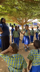 School children gather under tree in Gura Top, Nigeria