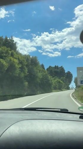 Driver captures sunny road journey near Sveti Stefan, Montenegro