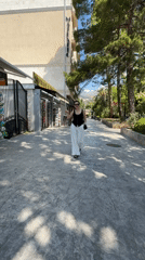 Morning street life captured in sunny Budva, Montenegro