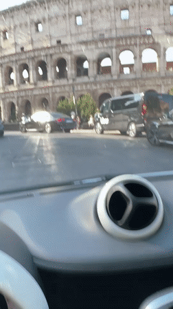 Street traffic in front of Rome's Colosseum