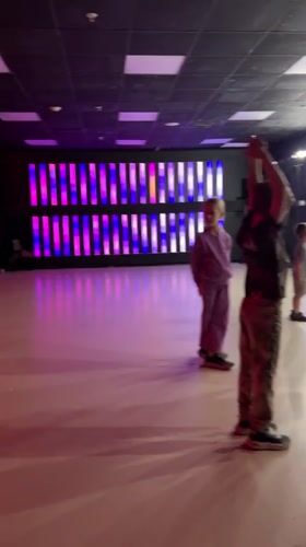 Kids' dance class in a colorfully lit Mytishchi studio
