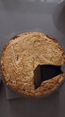 Domestic moments: fresh pie and tabby cat in Ramat Gan
