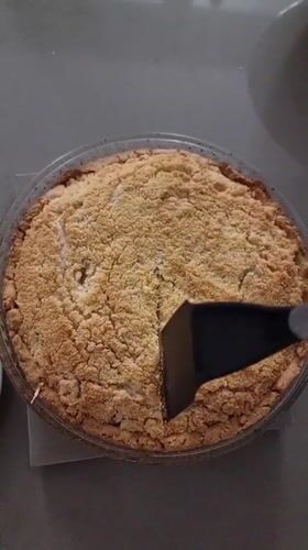 Domestic moments: fresh pie and tabby cat in Ramat Gan