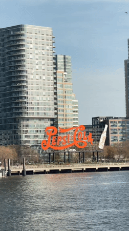 NYC waterfront landmarks documented including Pepsi sign, Roosevelt Island hospital