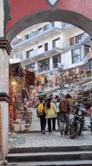 Everyday street life captured in Bhagsu tourist district