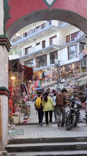 Everyday street life captured in Bhagsu tourist district