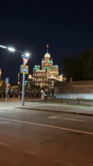 Moscow's Kotelnicheskaya Embankment Building illuminated at night