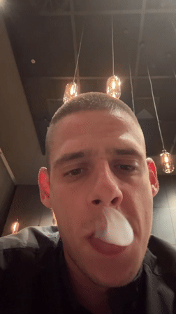 Man smoking, vaping at upscale Sofia restaurant captured in memories