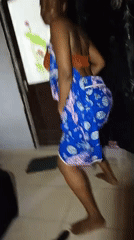 Woman dancing indoors recorded in Keffi, Nigeria