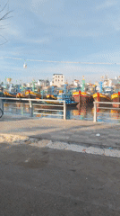 Colorful fishing boats docked at Phan Thiết harbor