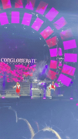 Musical performance staged in Almaty with branded backdrop