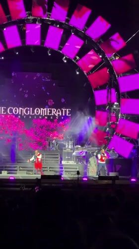 Musical performance staged in Almaty with branded backdrop