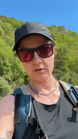 Hiker photographed on mountain trail in Montenegro